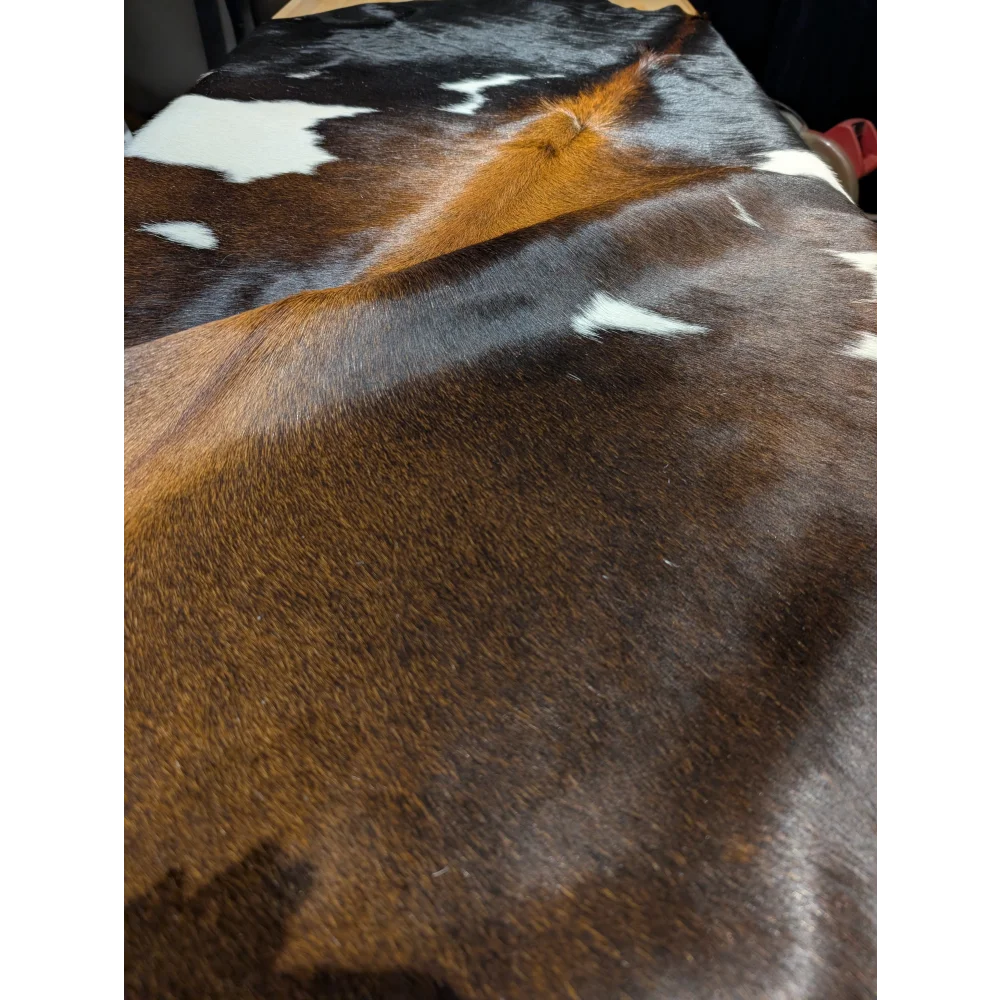 Extra large cowhide rug with brown white patches, leather texture