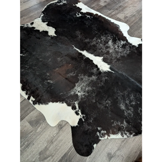 Large black and white cowhide rug with natural edges extra large cowhide for stylish floor decor