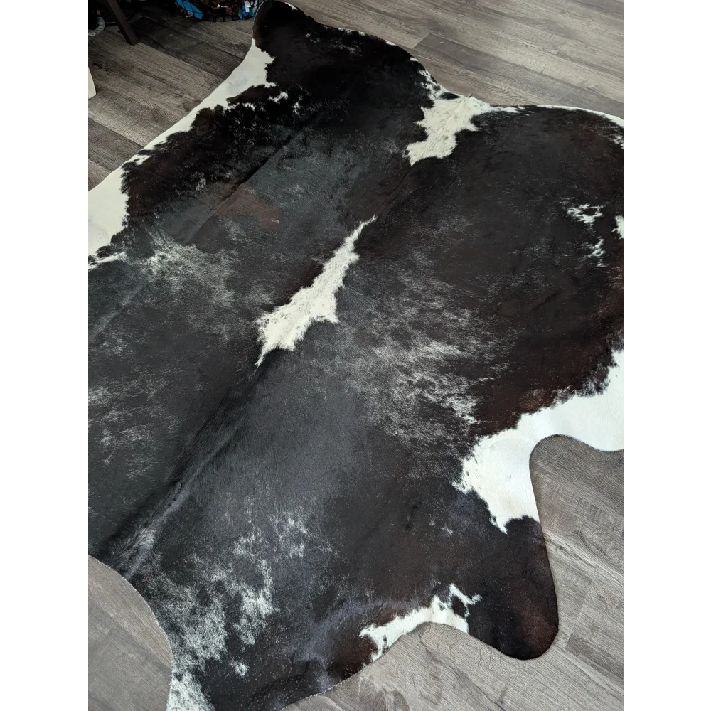 Extra large reddish black and white cowhide rug with natural fur texture large cowhide for stylish decor