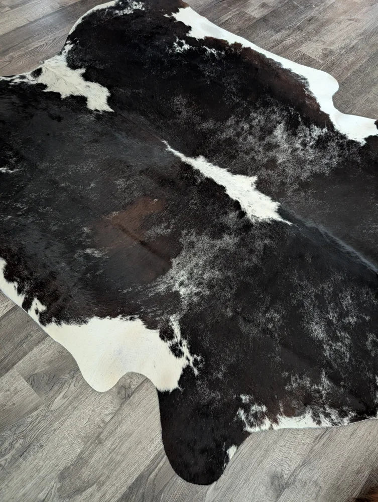 Large black and white cowhide rug with natural edges extra large cowhide for stylish floor decor