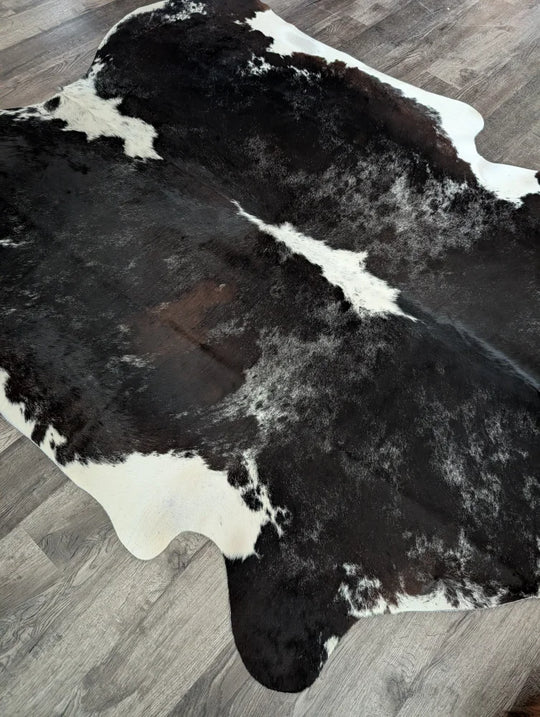 Large black and white cowhide rug with natural edges extra large cowhide for stylish floor decor