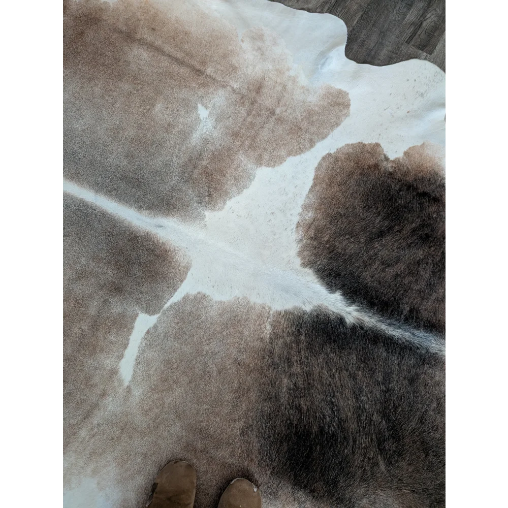 Reddish 498 extra large brown and white cowhide rug with natural fur texture perfect for large cowhide decor