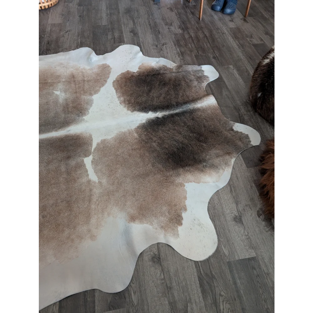 Reddish 498 extra large cowhide rug in natural brown and white with a soft textured surface perfect as a large cowhide