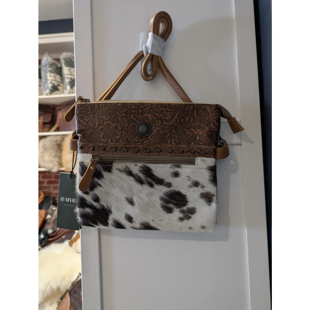 Remarkable hairon bag with brown leather clutch, floral embossing, real cowhide panel by Angus Oliver