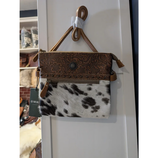 Remarkable hairon bag with brown leather clutch, floral embossing, real cowhide panel by Angus Oliver