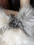 Ridiculously over the top grey sheepskin cushion in plush curly faux fur