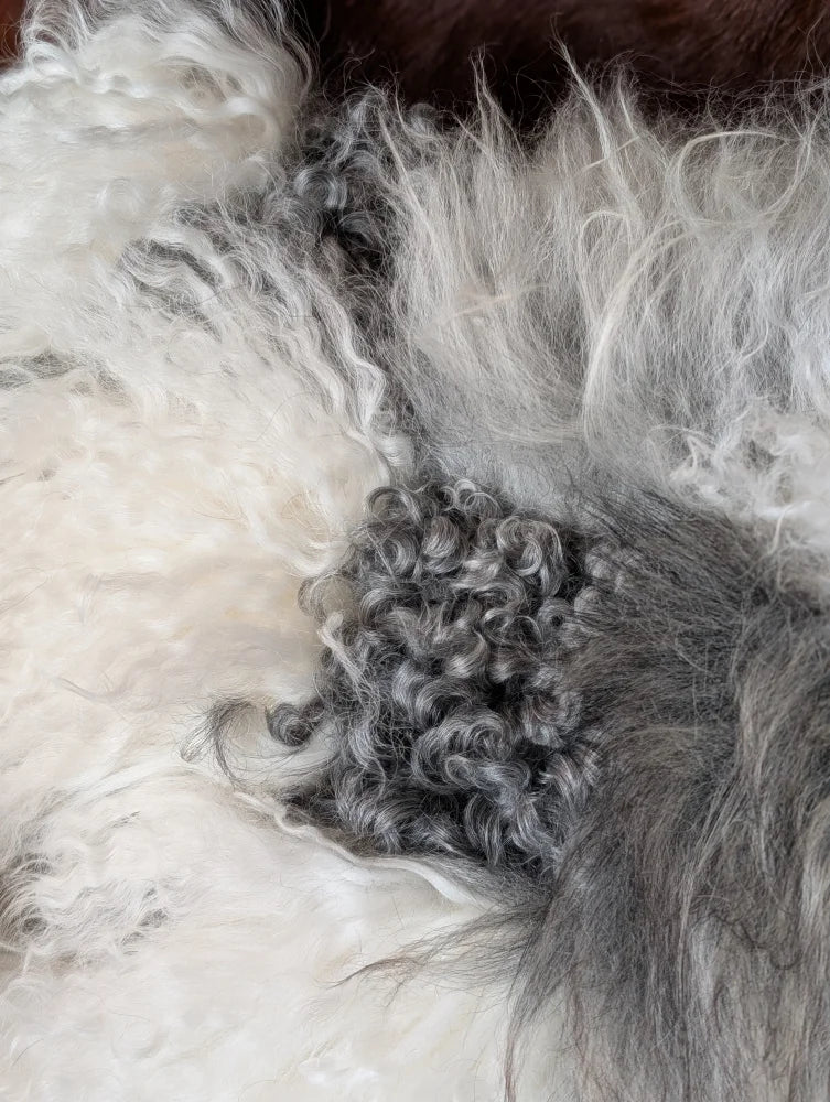 Ridiculously over the top grey sheepskin cushion rug fluffy texture