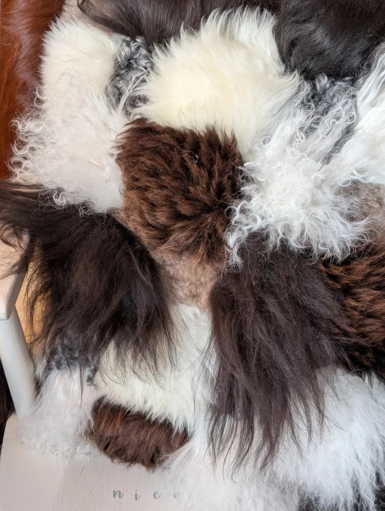 Ridiculously over the top checkered sheepskin cushion rug