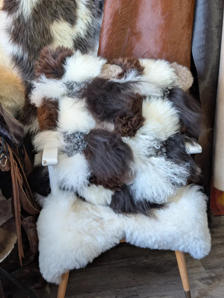 Ridiculously over the top checkered sheepskin cushion with fluffy patchwork fur