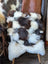 Ridiculously over the top checkered sheepskin cushion with fluffy patchwork fur