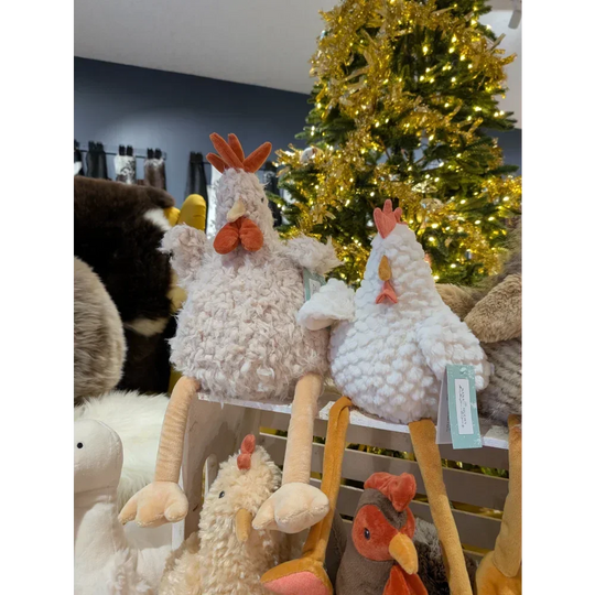 Angus Oliver white fluffy chicken plush toy with sheepskin rug vibe