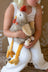 A plush stuffed chicken named Rupert the Rooster with a striped gray and white body and soft beige wings
