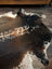 Extra large cowhide rug in salt and pepper brown with natural irregular patterns perfect for beautiful rugs and decor