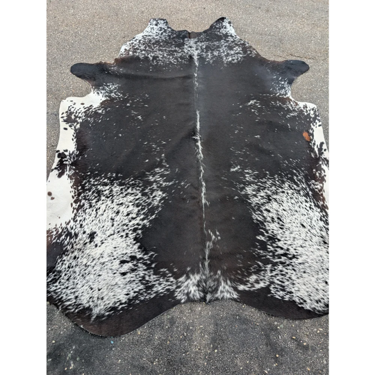 Salt & Pepper Tri extra large cowhide rug with black and white spots and leather texture