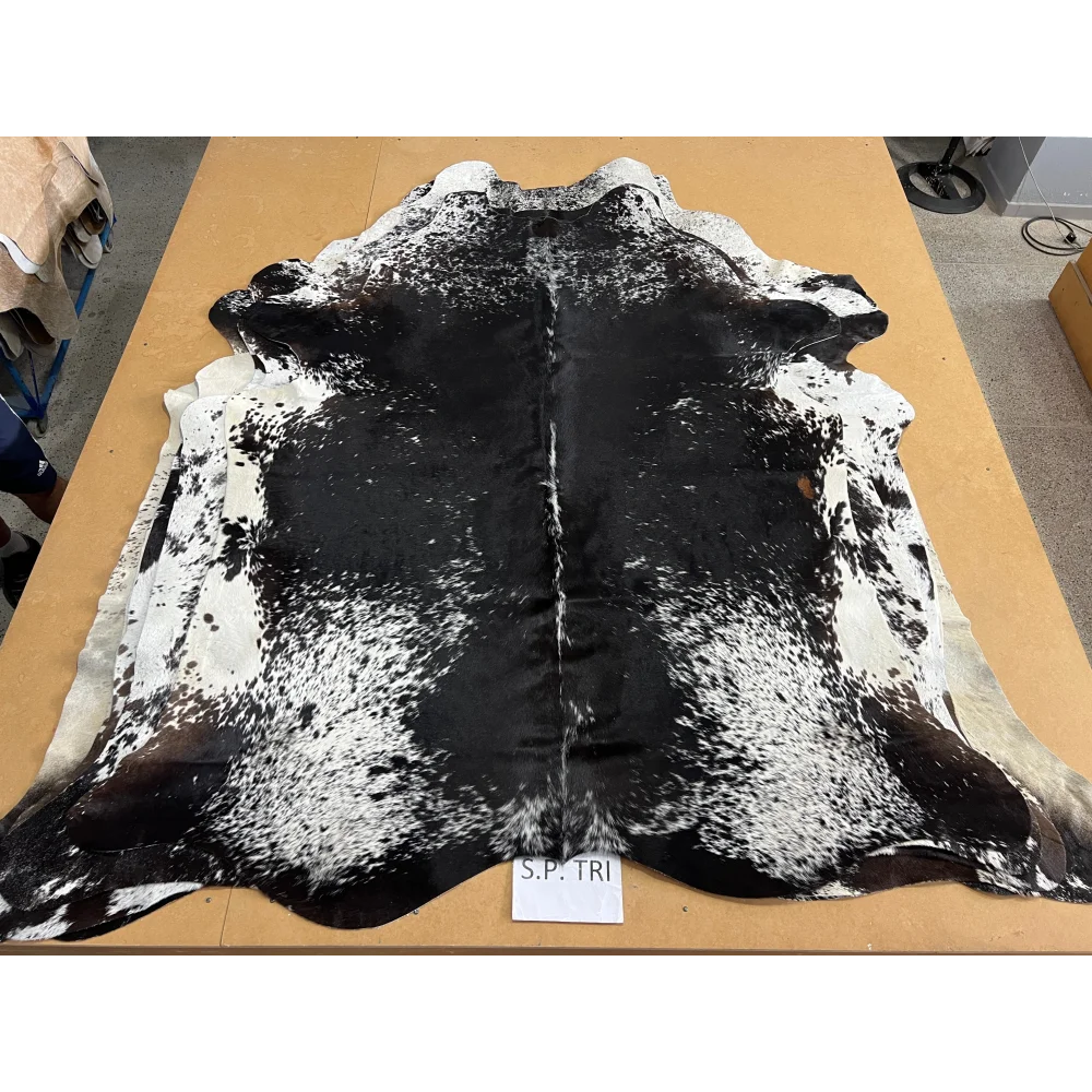 Black and white speckled cowhide rug from Salt & Pepper Tri #34 coming soon, cowhides make beautiful rugs