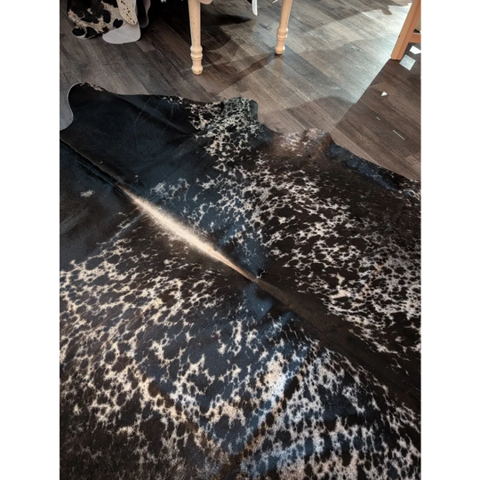 Salt and pepper tricolour extra large cowhide rug with black and white spots and natural textured surface perfect for beautiful rugs