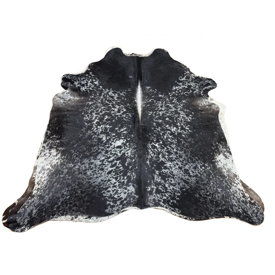 Large extra large cowhide rug in black and white spotted salt and pepper tricolour with natural irregular edges