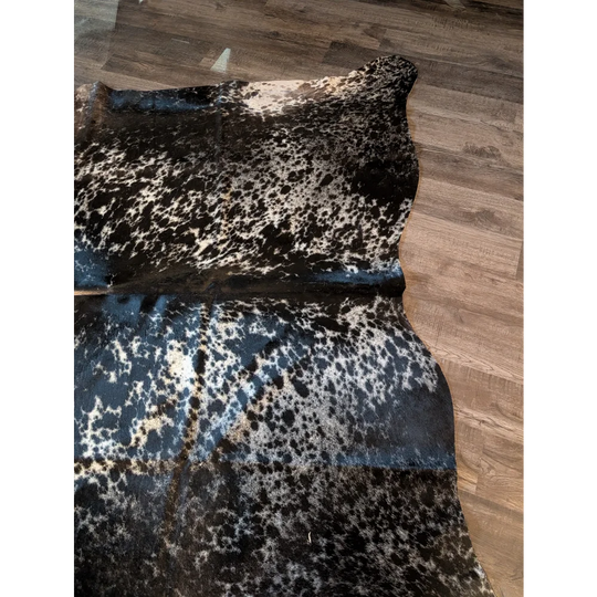 Extra large cowhide rug in black and white spotted salt and pepper tricolour with natural textured surface perfect for beautiful rugs