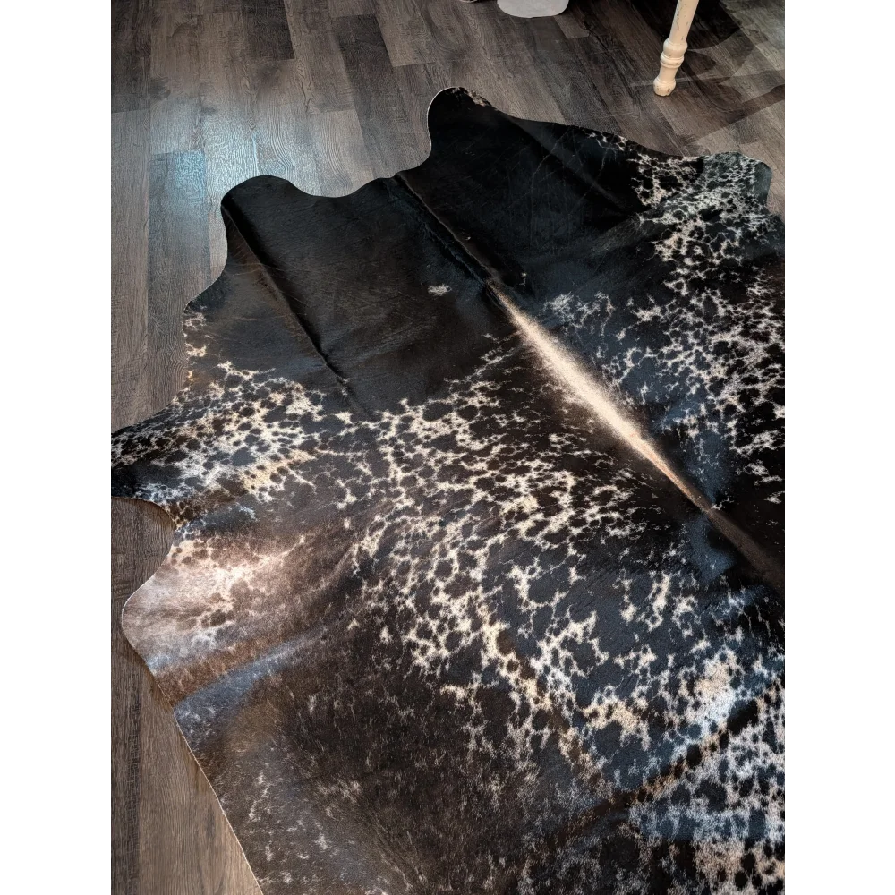 Salt and pepper tricolour large cowhide rug with black and white spots and natural irregular edges extra large cowhide