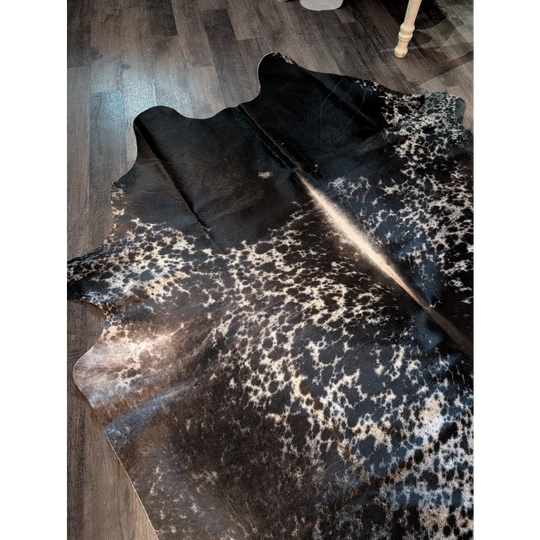 Salt and pepper tricolour large cowhide rug with black and white spots and natural irregular edges extra large cowhide