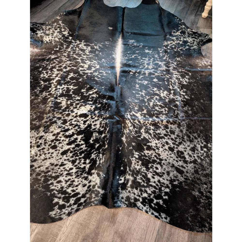 Salt and pepper tricolour large cowhide rug with black and white spotted natural textured surface for beautiful rugs