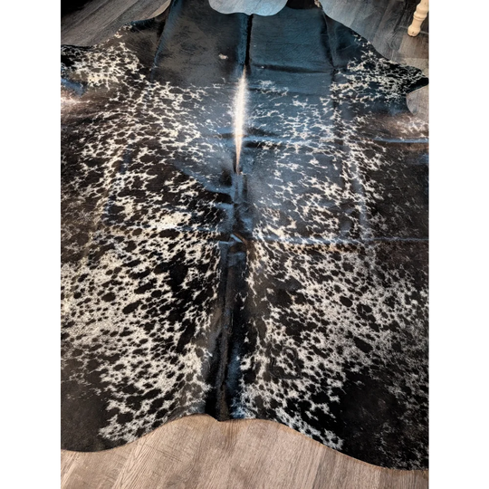 Salt and pepper tricolour large cowhide rug with black and white spotted natural textured surface for beautiful rugs