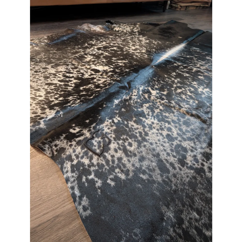 Salt and pepper tricolour extra large cowhide rug with black and white spots and a natural textured surface perfect for beautiful rugs