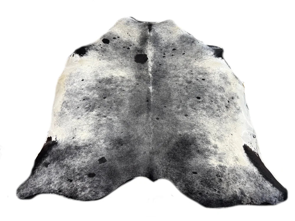 A large cowhide rug saltpepblk365 with beautiful black and white spotted pattern and soft textured fur arriving soon