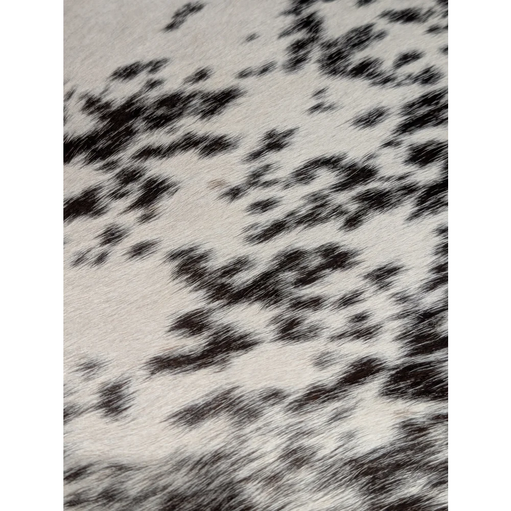 Extra large cowhide rug with black and white spots, unmistakable aura