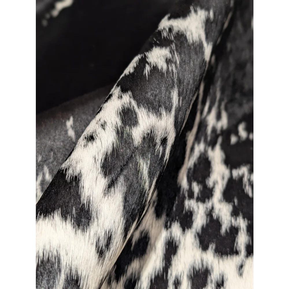 Extra large cowhide rug with black white spots, fur texture from tanning process