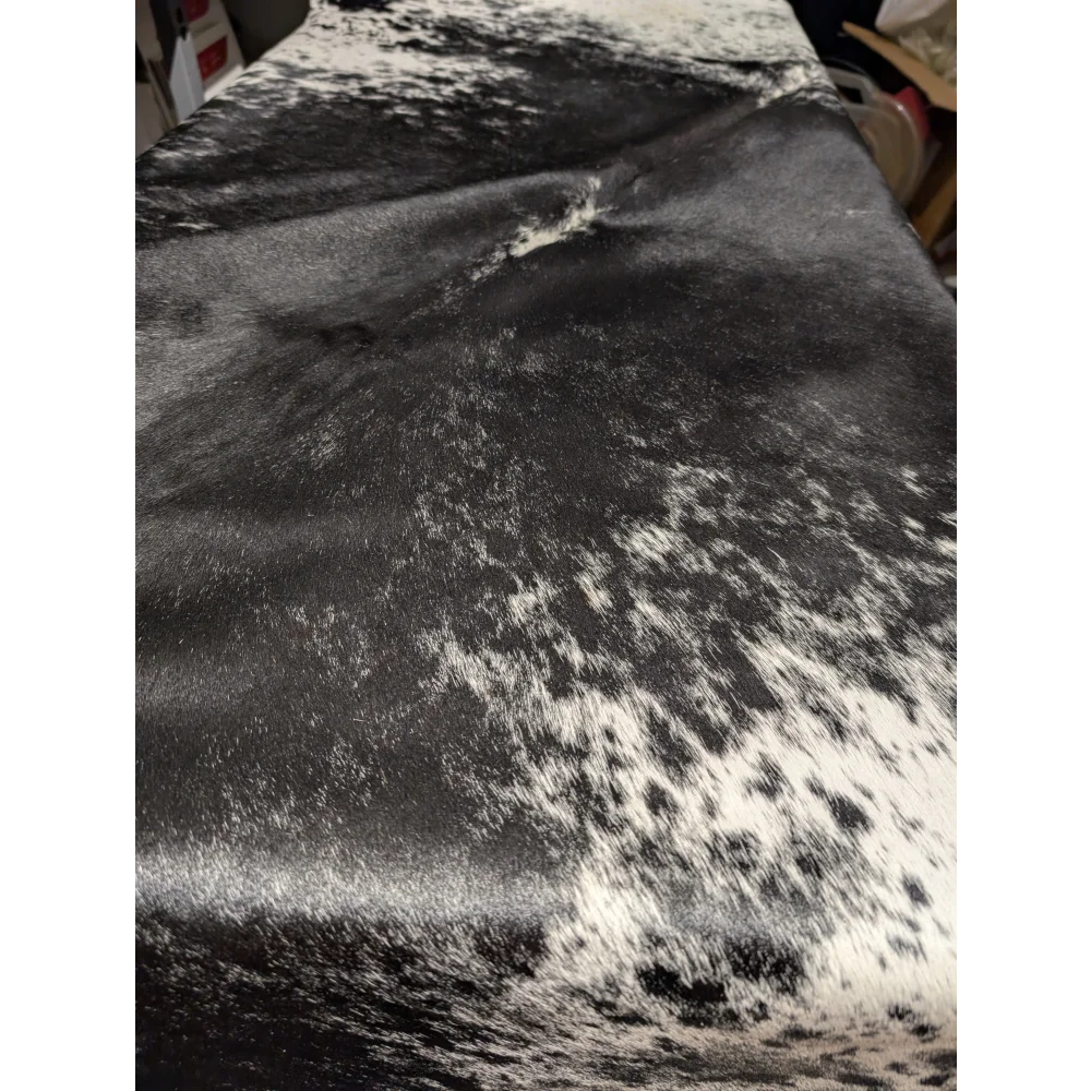 Extra large cowhide rug with black white spots, soft underfoot leather texture
