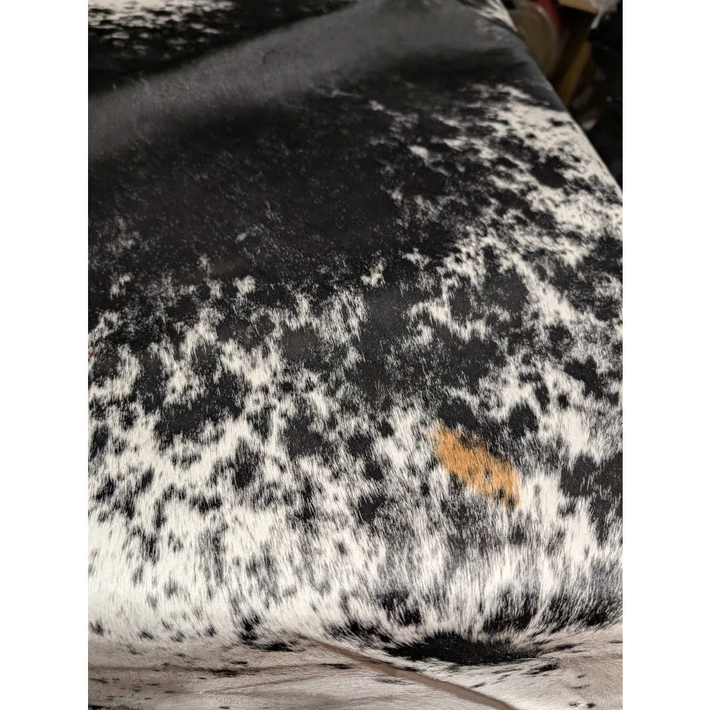Extra large black and white cowhide rug with tan patches, soft underfoot