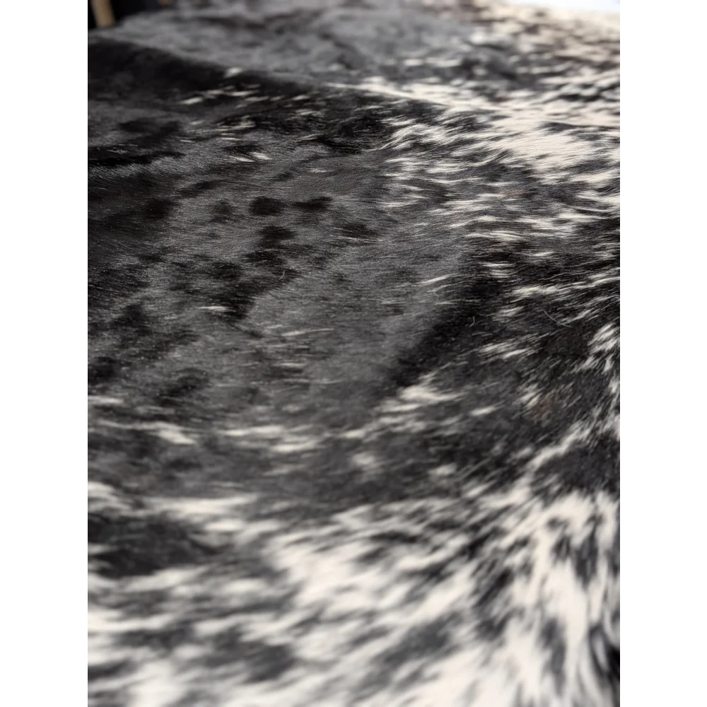 Extra large cowhide blanket with black and white speckled fur pattern, 94x88 inches