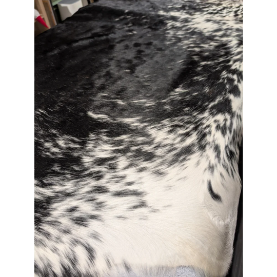Extra large black and white cowhide blanket with speckled pattern, 94x88 inches