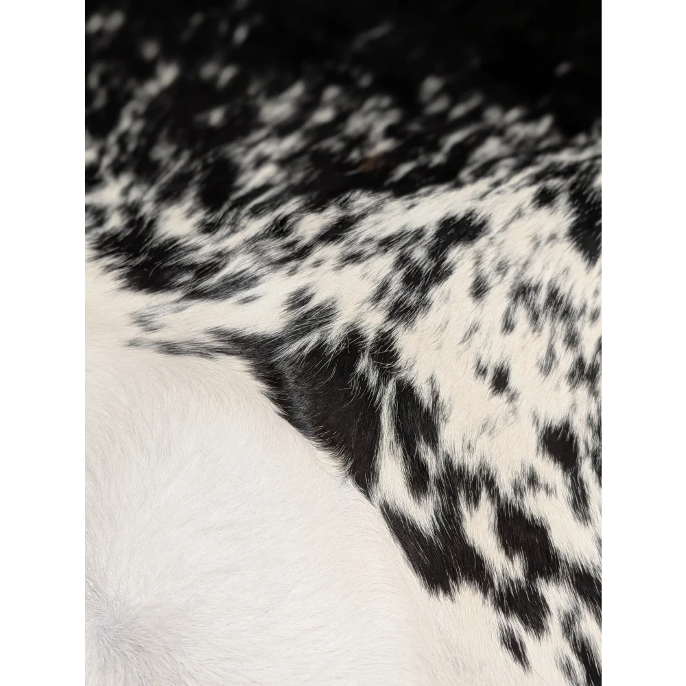 Extra large black and white cowhide rug, speckled pattern, textured for foot traffic