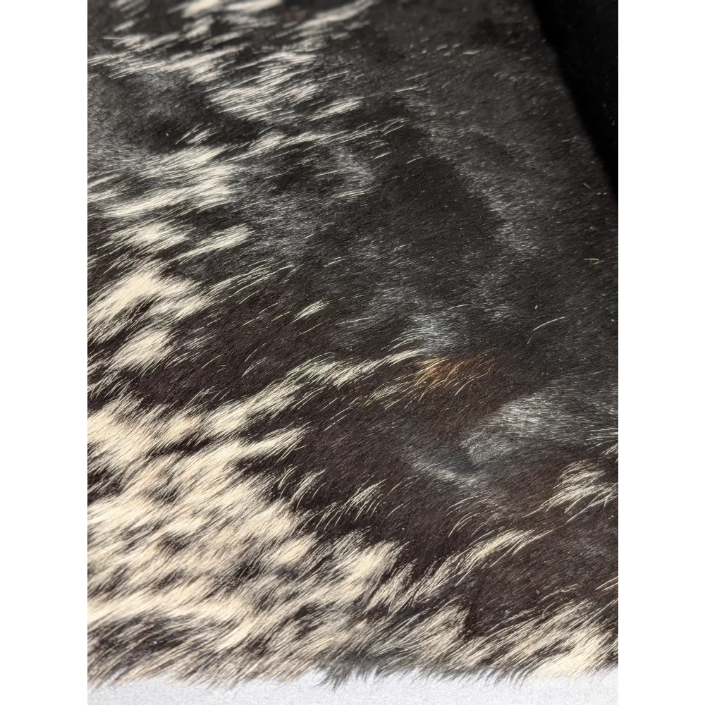 Extra large cowhide black and white fur coat with speckled pattern