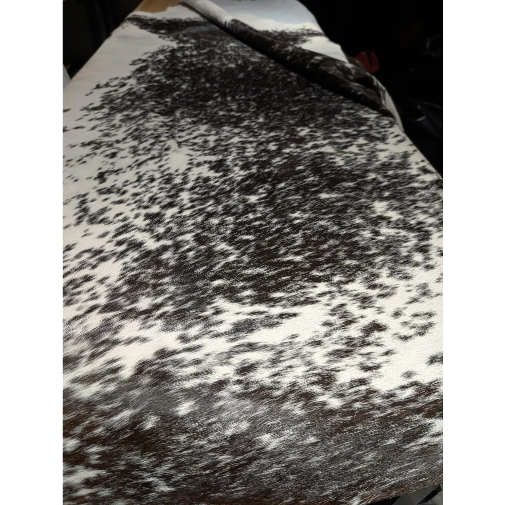 Gorgeous extra large cowhide rug with black white speckled pattern