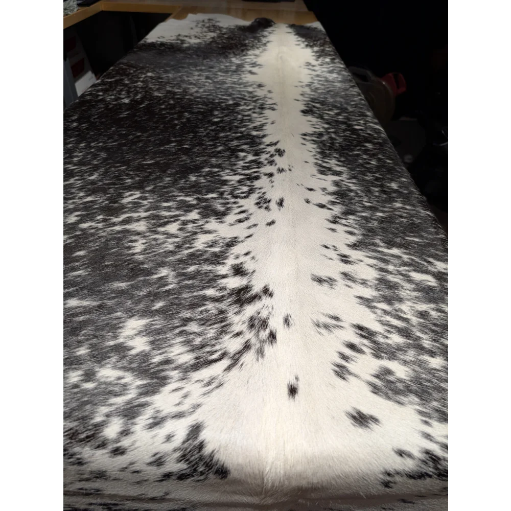 Extra large cowhide rug with black and white spots, leather texture