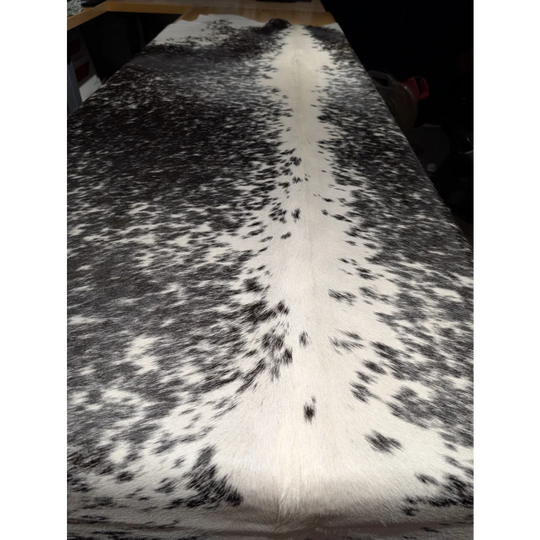 Extra large cowhide rug with black and white spots, leather texture