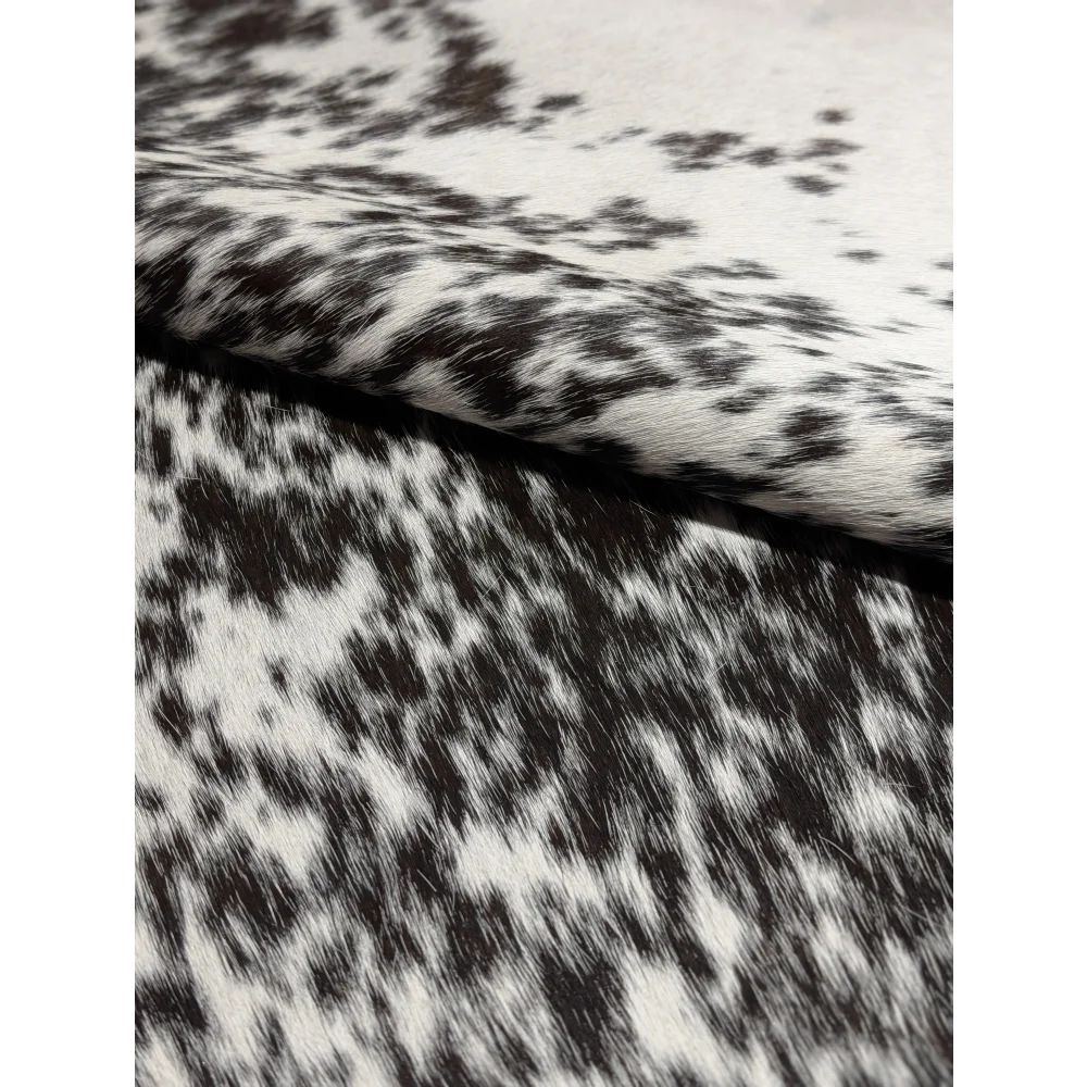 Extra large cowhide rug with black and white spots, leather texture
