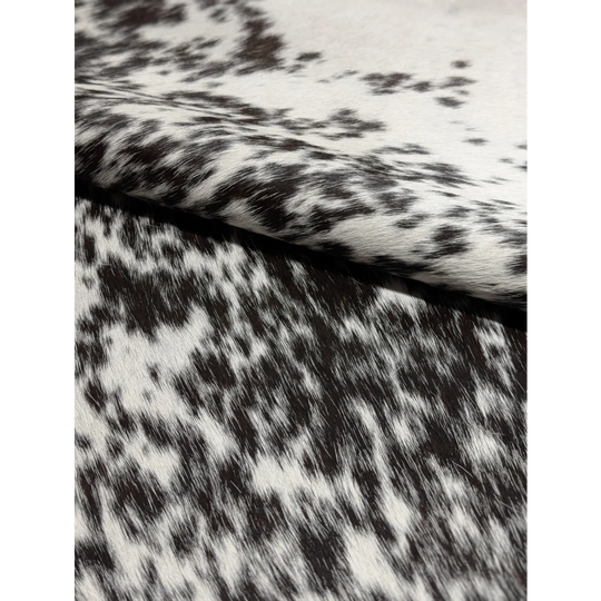 Extra large cowhide rug with black and white spots, leather texture