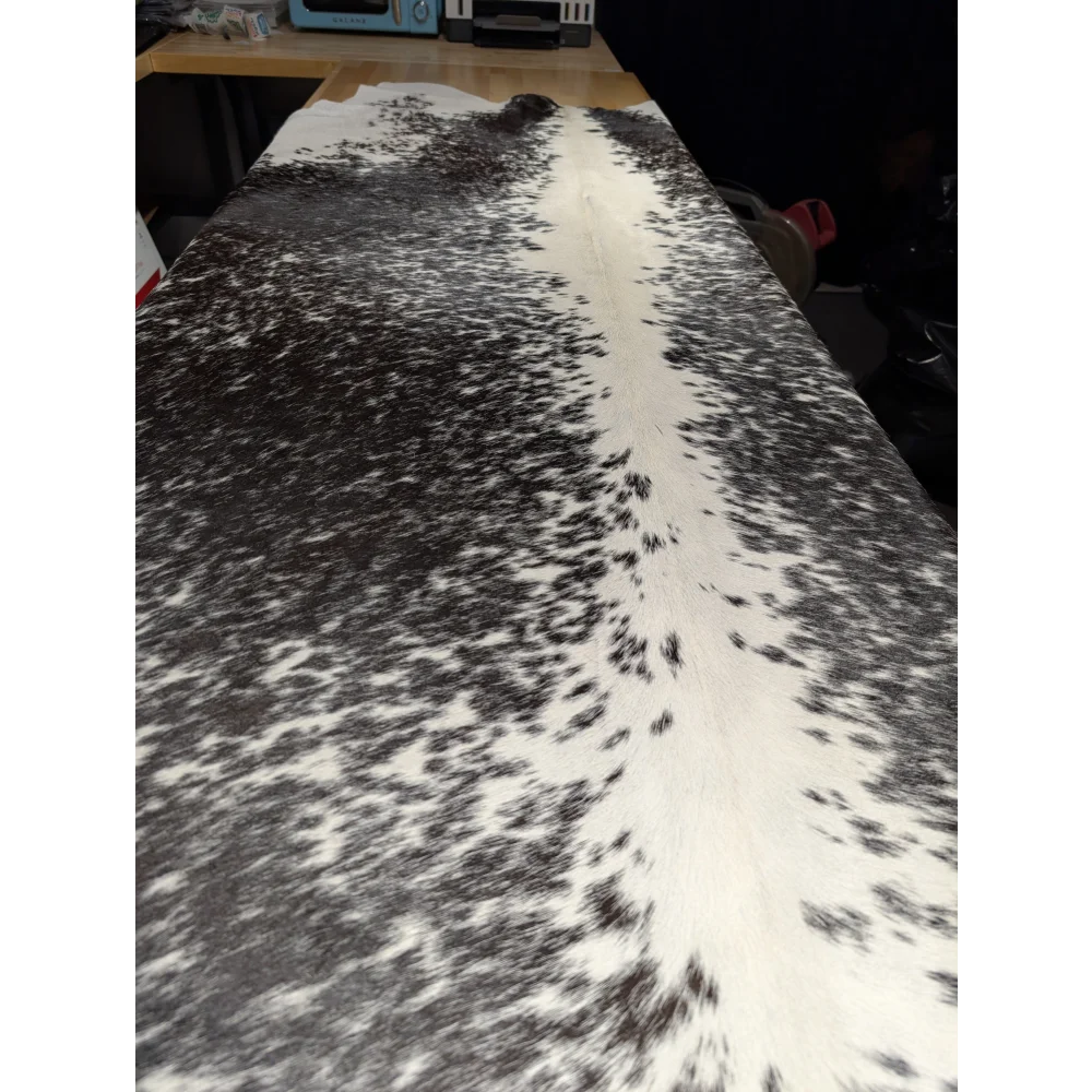 Extra large cowhide rug with black and white spots, leather texture