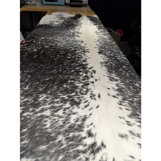 Extra large cowhide rug with black and white spots, leather texture