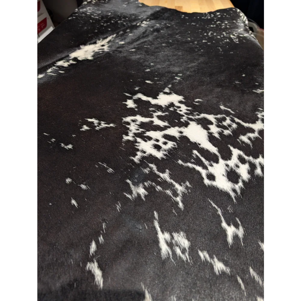 Extra large cowhide rug with black and white spots, leather texture