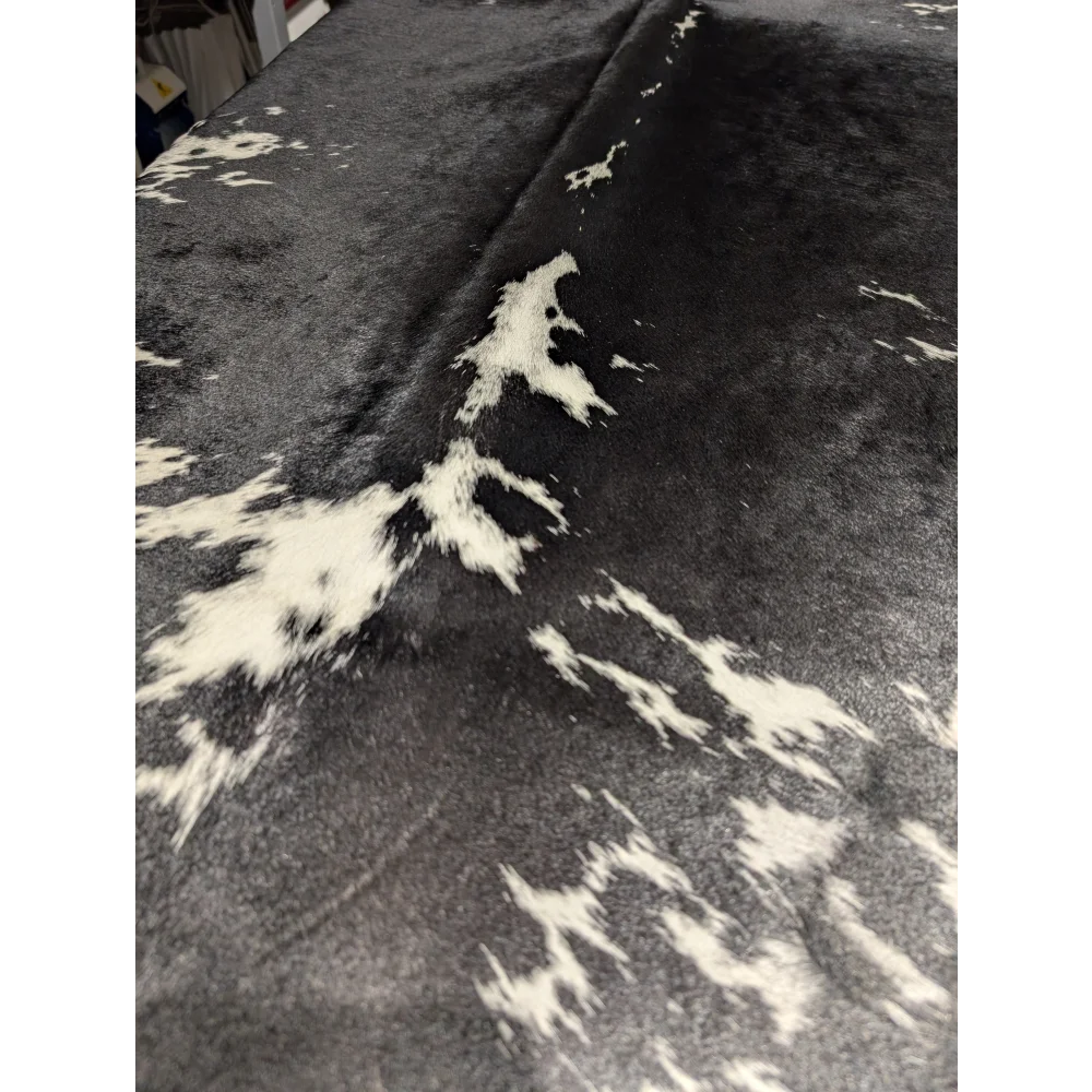 Extra large cowhide rug with black white spots, leather texture