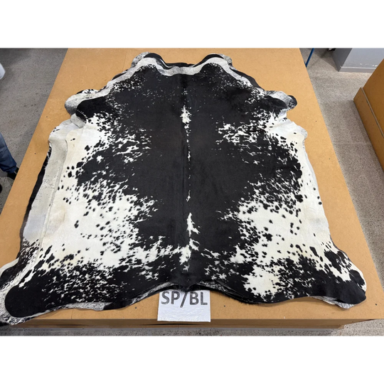 Extra large cowhide rug with black and white spots, leather after tanning process