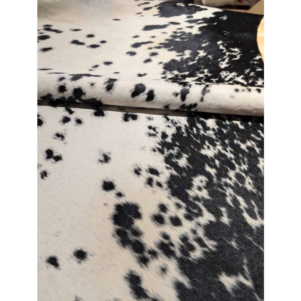 Extra large cowhide rug with black and white spots, leather texture