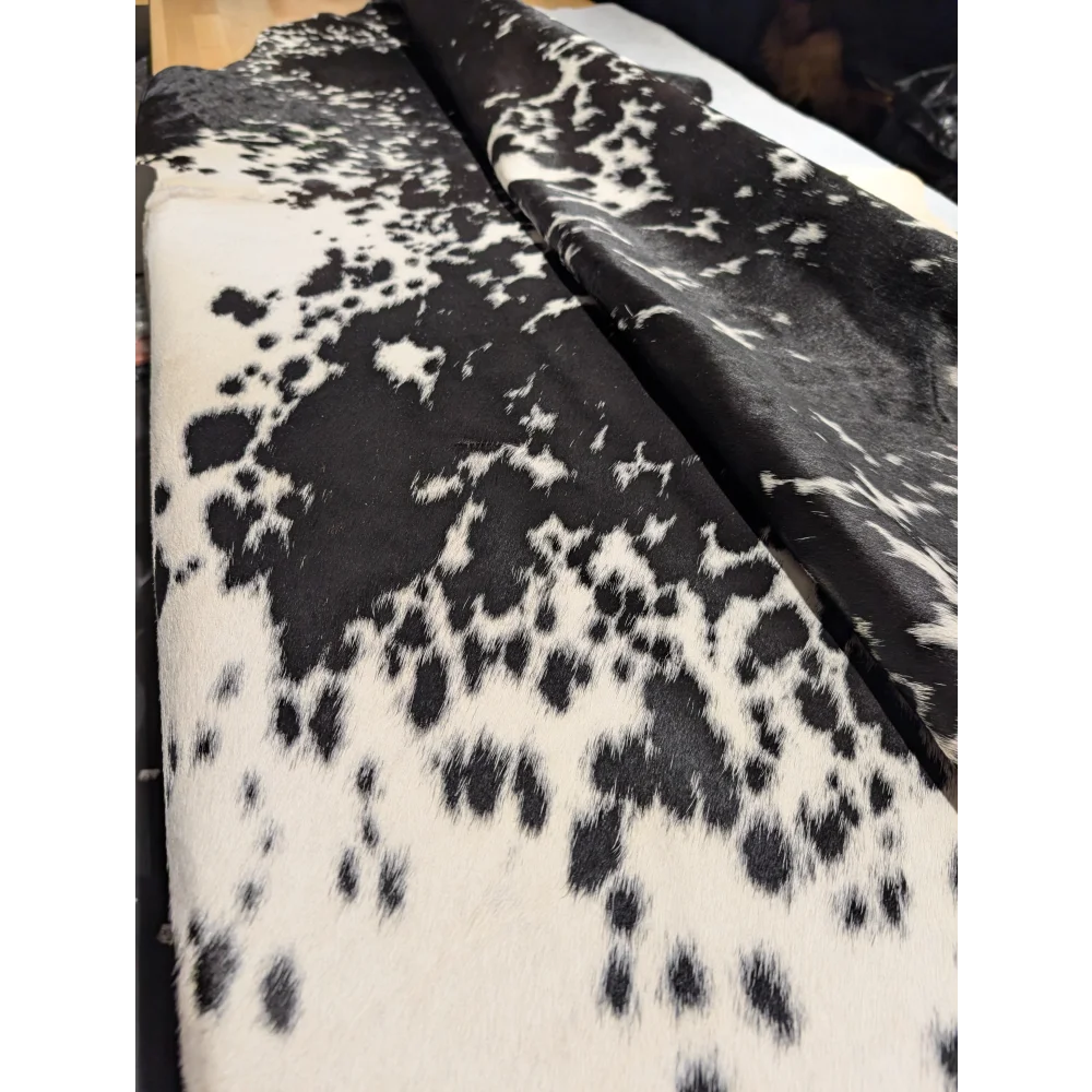 Extra large cowhide blanket with black and white spots, leather texture