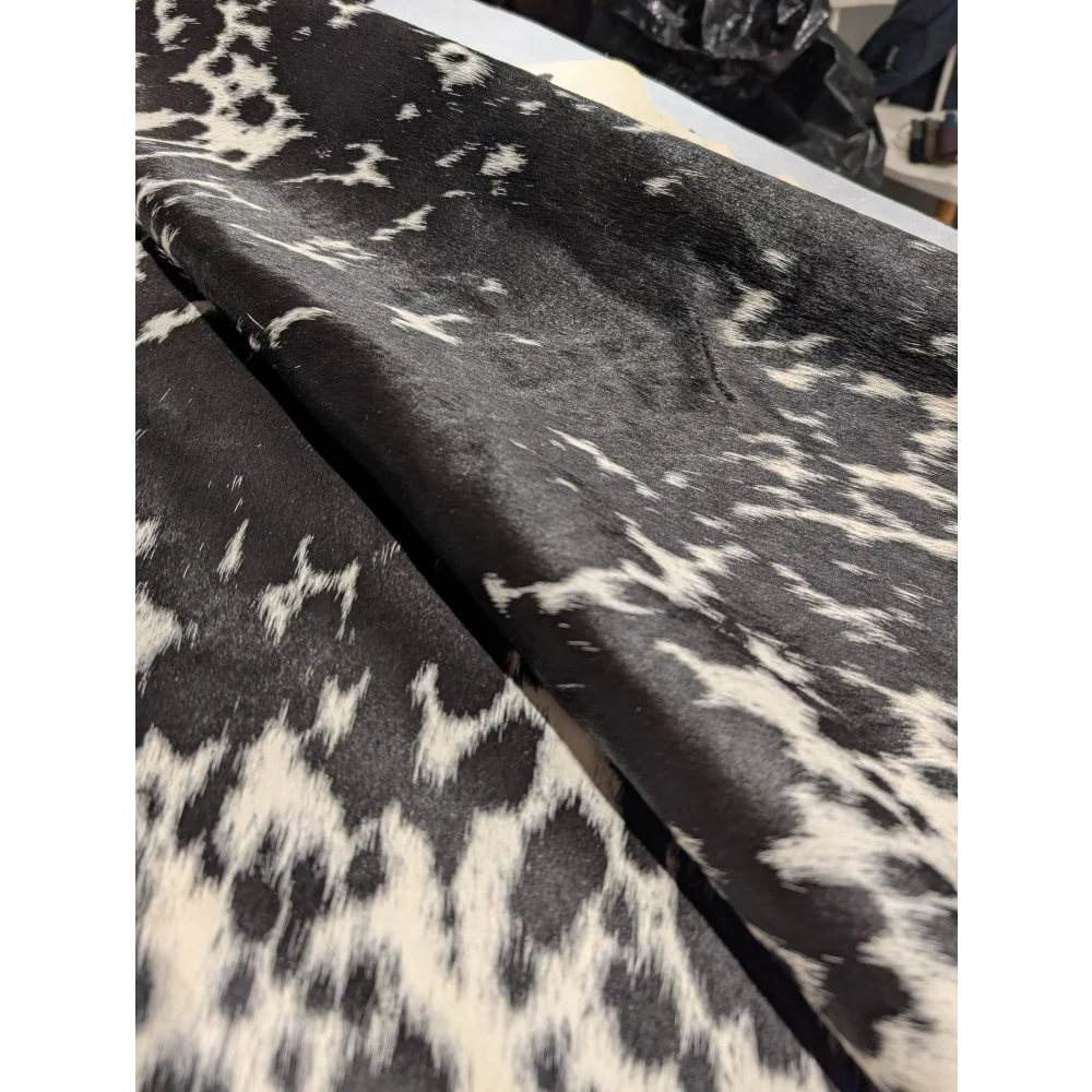 Extra large cowhide blanket in black and white pattern, smooth texture