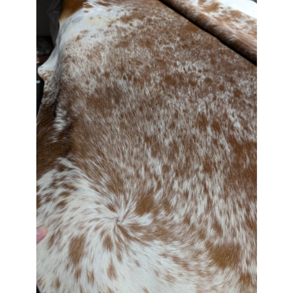 Extra large cowhide rug with brown and white speckled faux fur plush texture